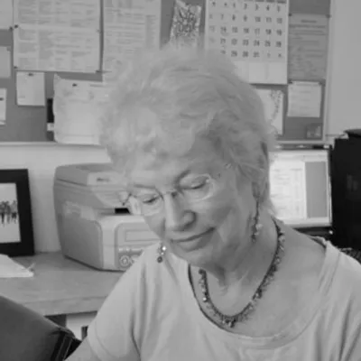 Jenni, one of the two founders, in a black and white photograph.
